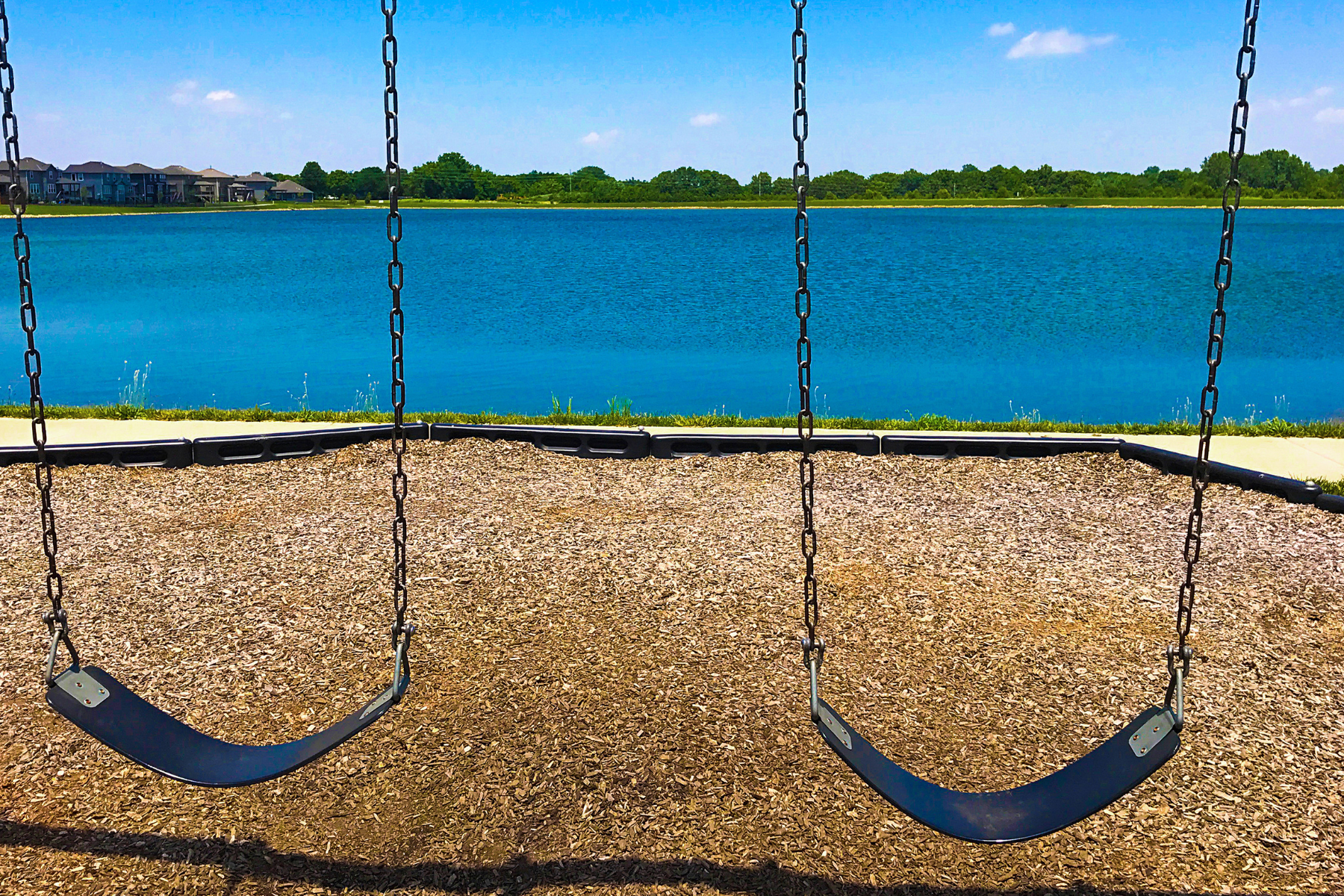 Lakeside Swing Set Does Not Obstruct Homeowner View