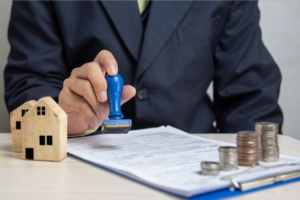 Attorney stamping a Michigan condominium master deed and bylaws amendment for recording — cost and process guide.